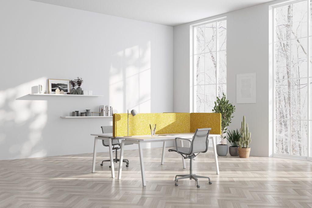 gelbe Lärmschutzwand auf dem Tisch